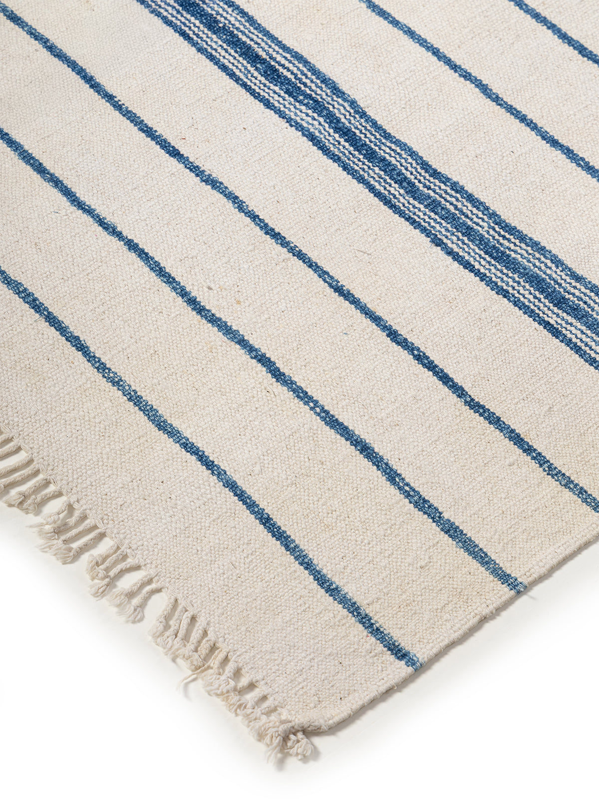 Tidal Flow Rug close-up showing the cotton weave and striped pattern