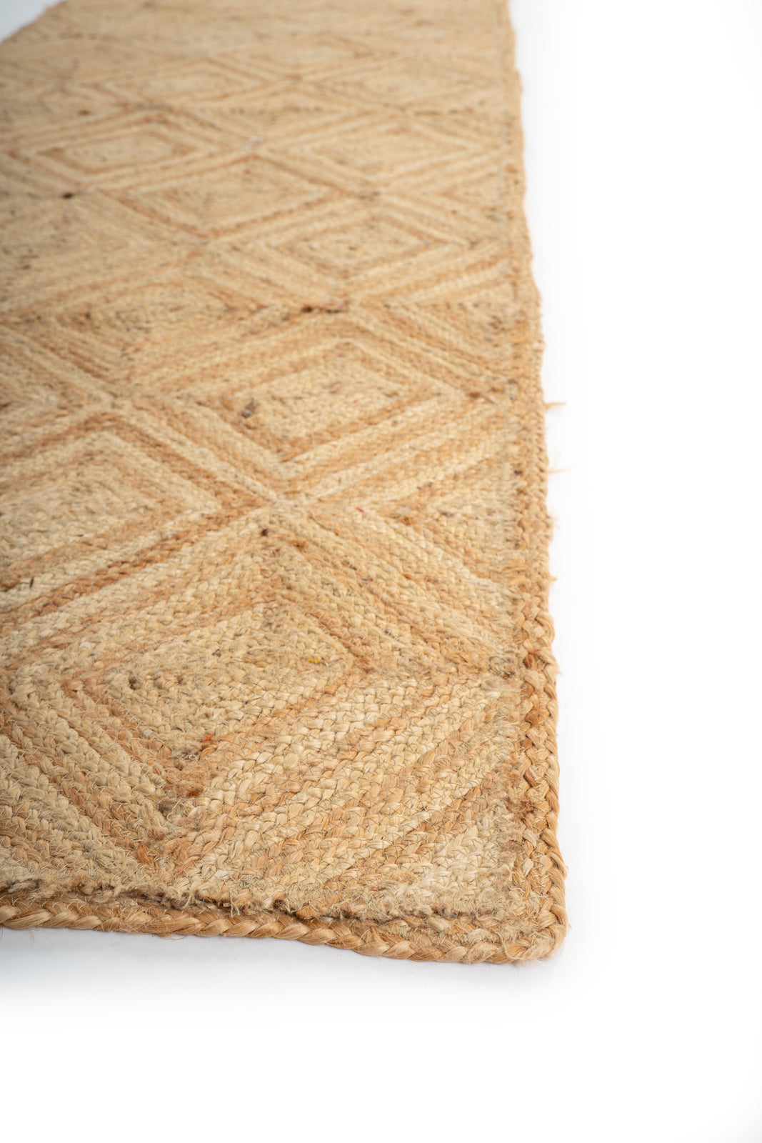 Tiko jute braided area runner detail showing edge binding and jute finishing of the runner