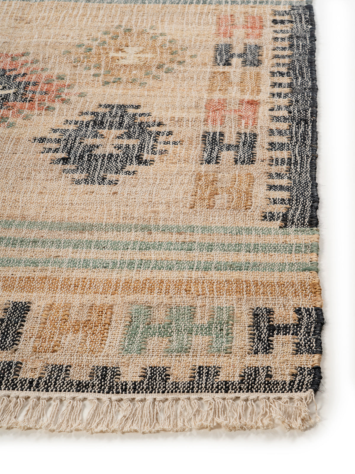 Tonal Chevron Band Jute Rug jute rug styled in a living room interior