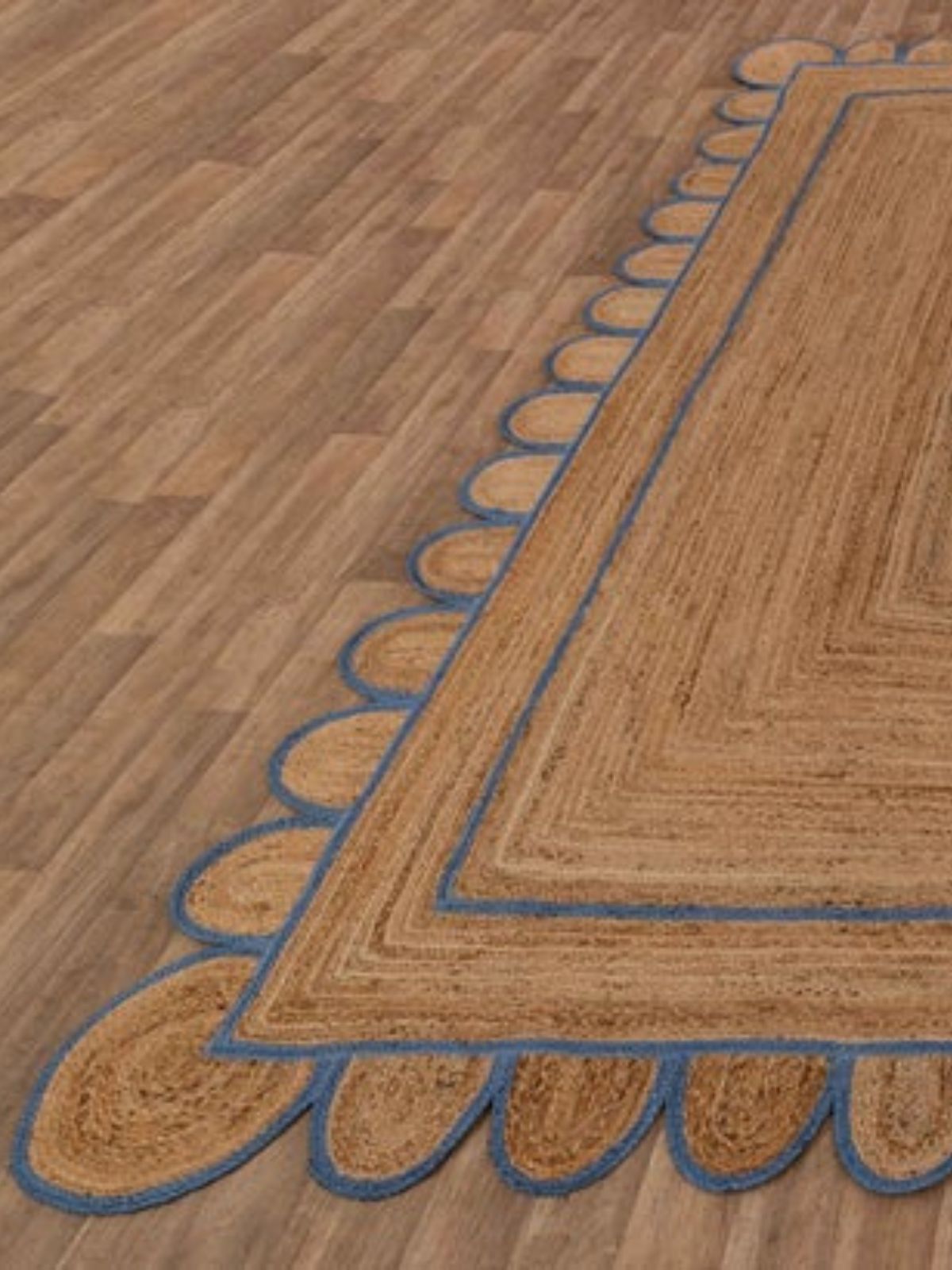 Tripoli scalloped jute braided rug-Blue close-up showing the jute weave and surface texture