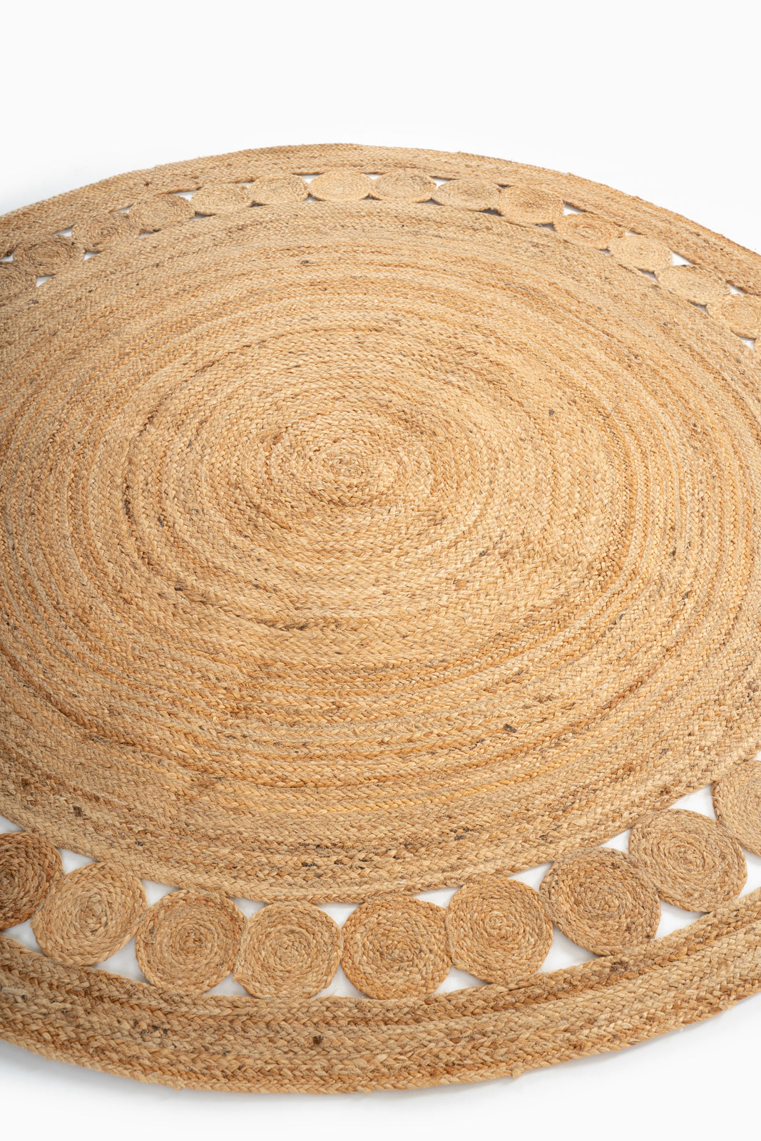 Tunis round jute rug jute rug styled in a living room interior