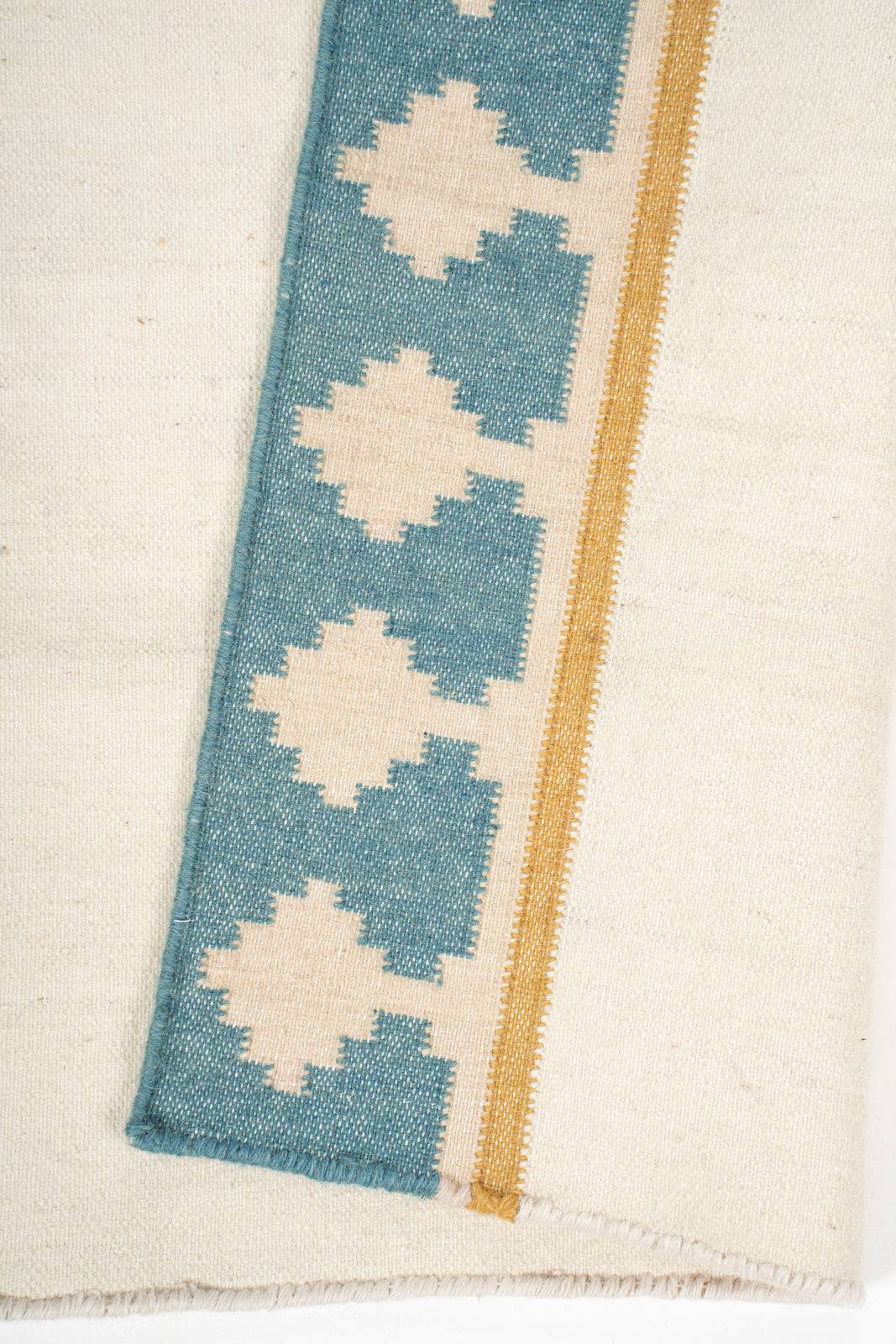 Turquoise Crossroads detail of the geometric pattern in wool