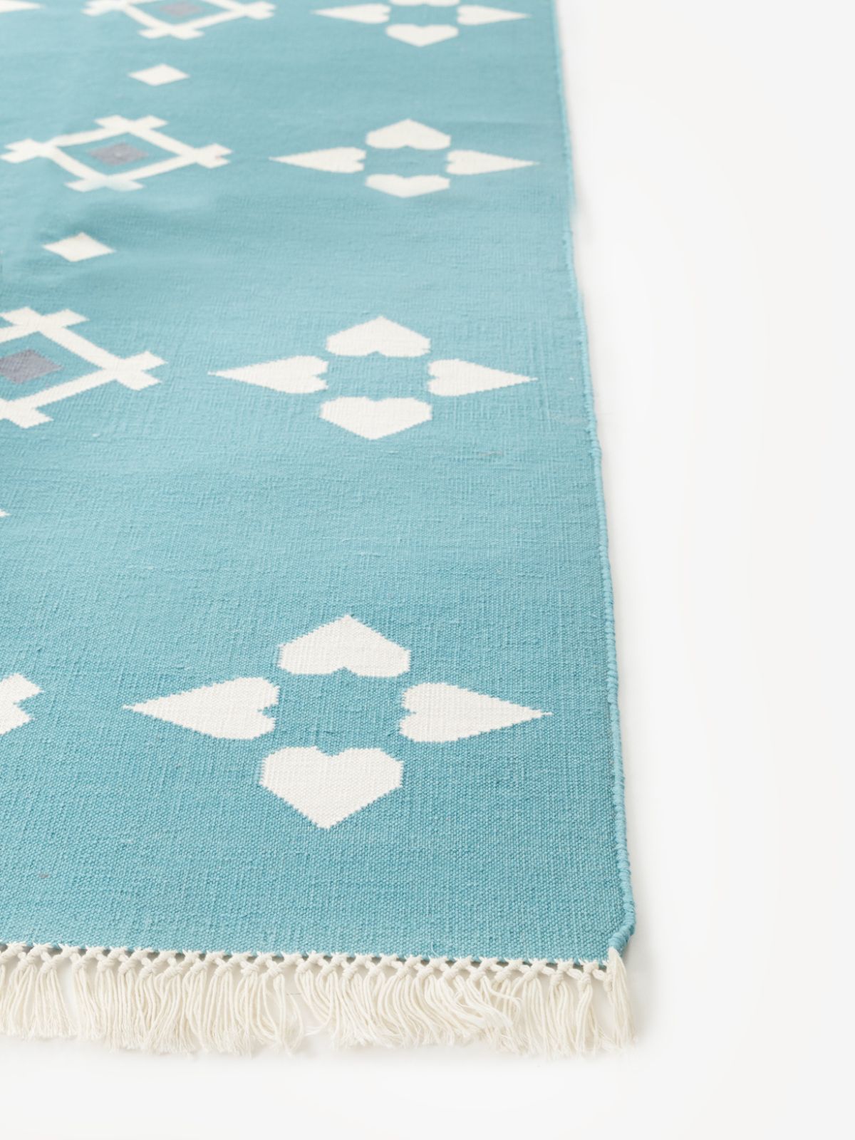 Turquoise Flatweave rug - texture detail showing cotton surface