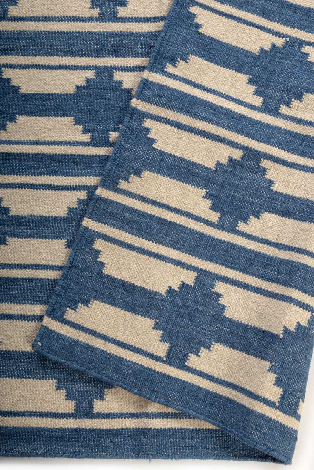 Velden Calm Rug detail showing the textured wool surface and finishing