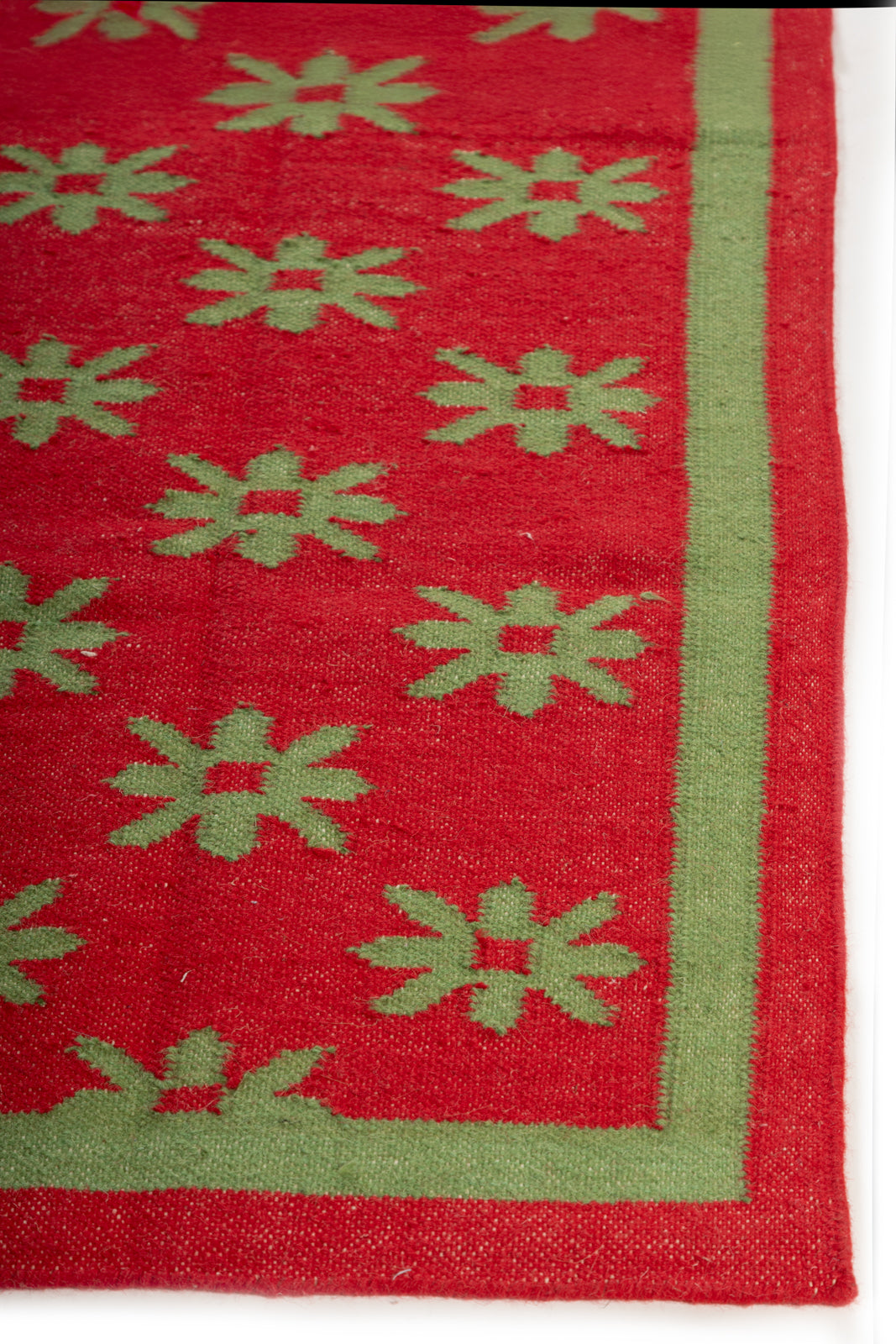 Verdant Bloom Wool Dhurrie wool rug styled in a living room interior