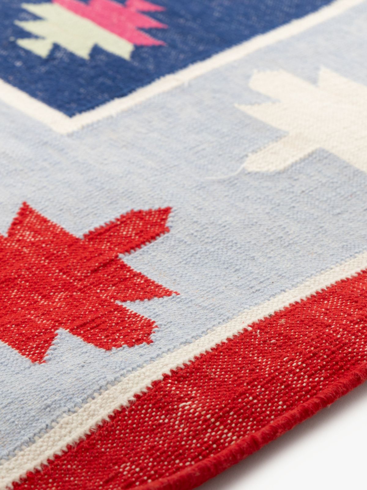Vibrant Kaleidoscope close-up showing the cotton weave and geometric motif