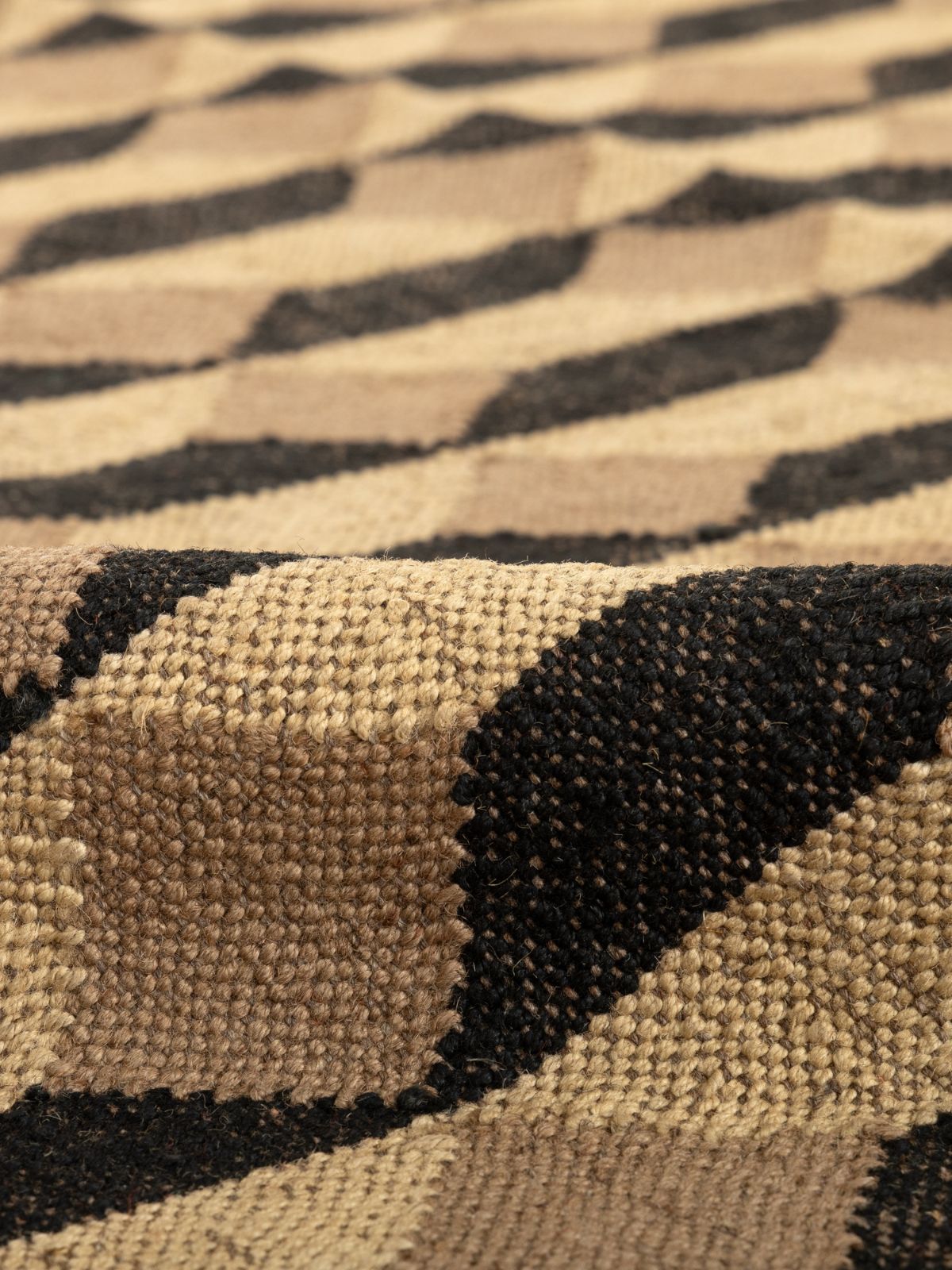 Wave Crest Wool Flatweave Rug detail of the geometric pattern in wool