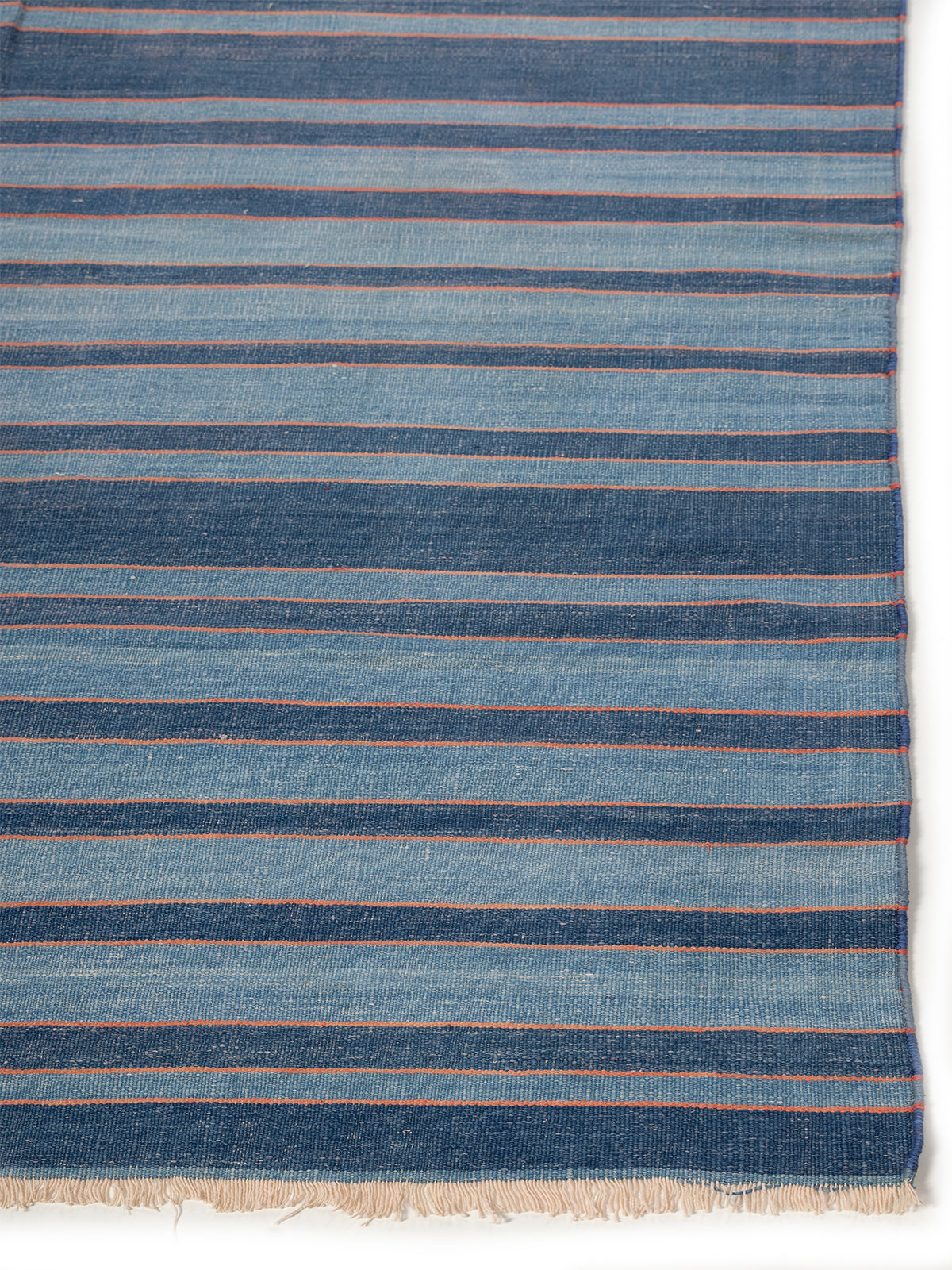 Wayfarer Stripes Dhurrie cotton rug styled in a living room interior