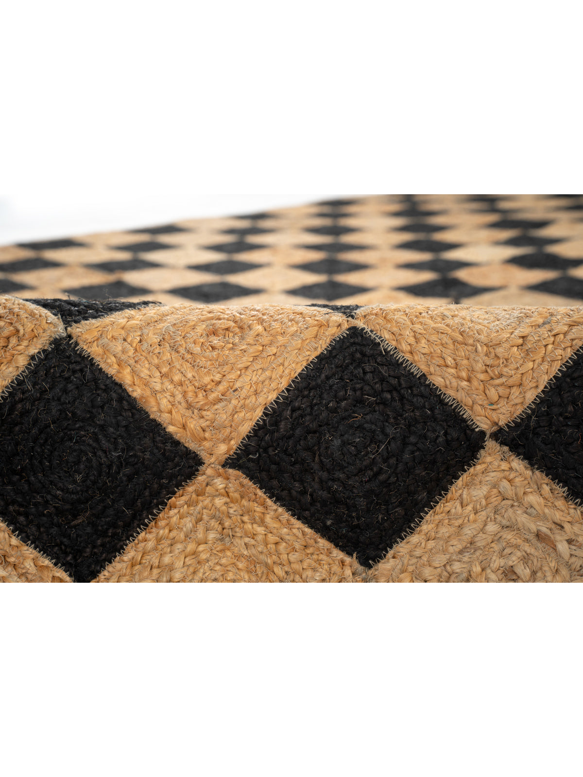 Windsor checkered Jute rug-Jet Black close-up showing the jute weave and geometric motif