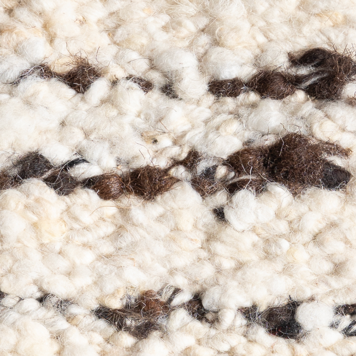 Wool Glen : Heathered Peak close-up showing the handcarded wool weave and surface texture