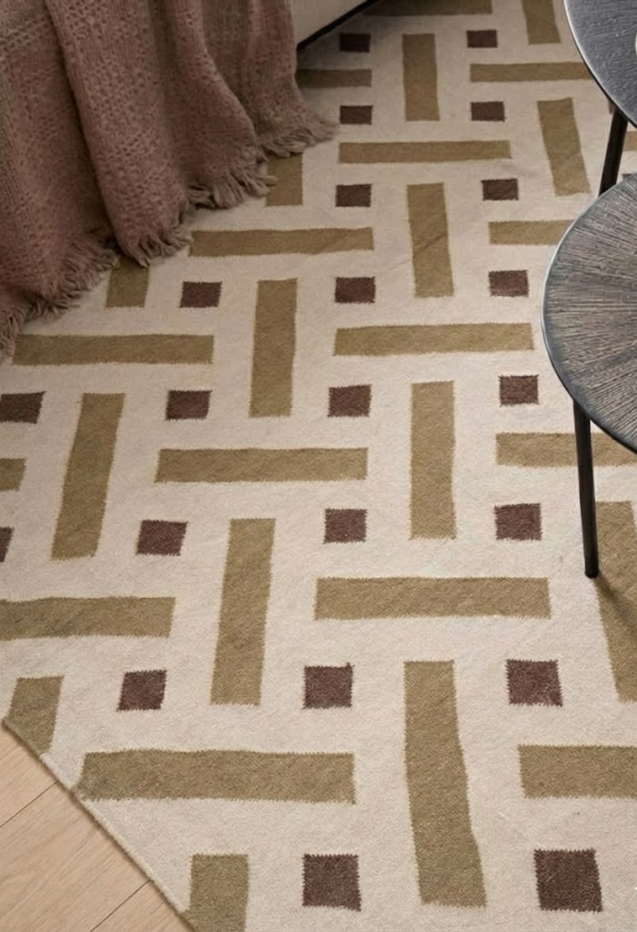 Woven Heritage Wool Rug wool rug styled in a living room interior