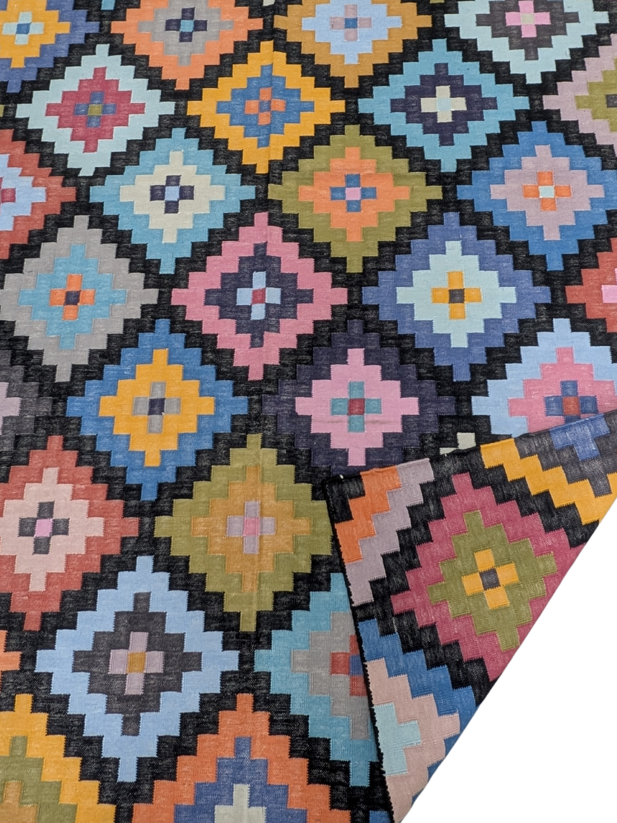 Woven Whimsy Kilim Dhurrie Rug detail of the geometric pattern in cotton