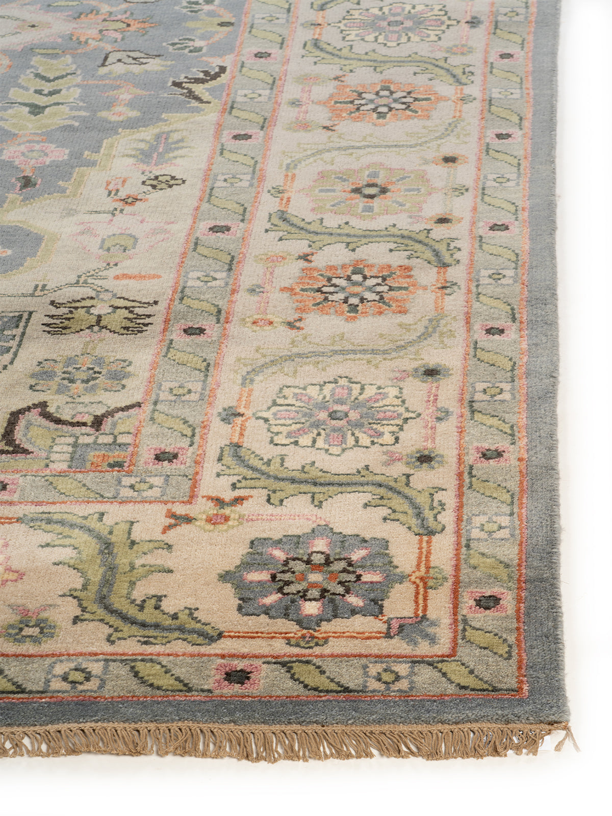 Zarafshan Sky handspun wool rug styled in a living room interior